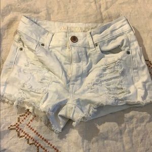 White ripped high waisted jean shorts